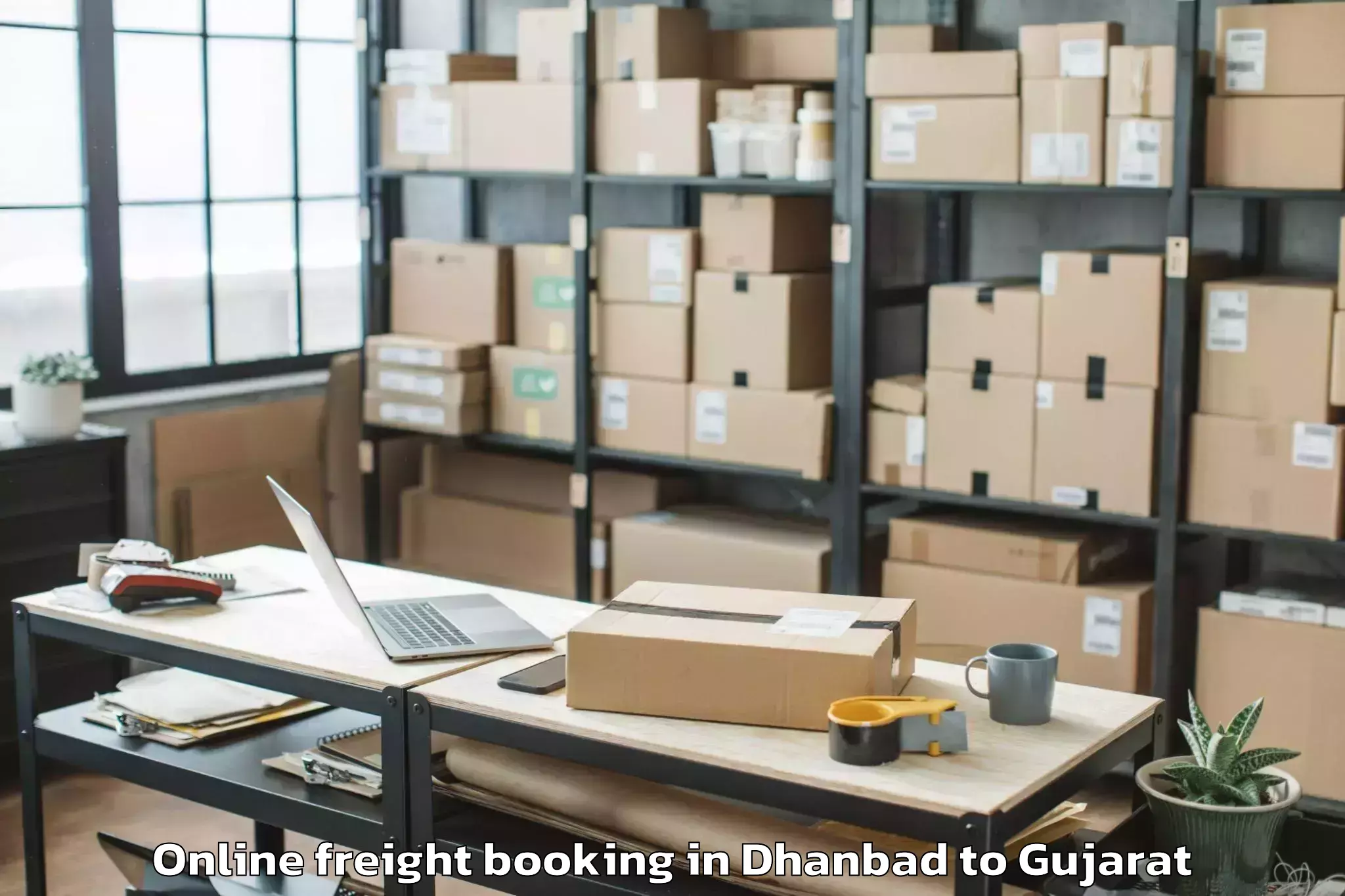 Dhanbad to Malpur Online Freight Booking